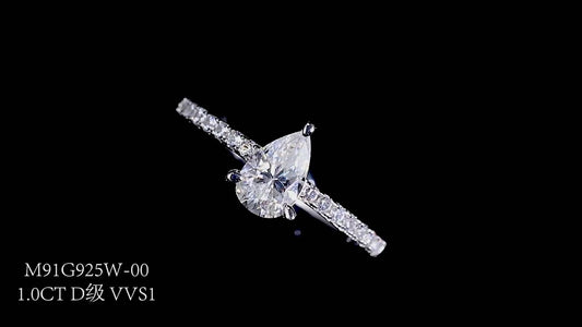 1.0 Carat Pear-Cut Micro-Pavé Synthetic Moissanite Dewdrop Ring in Sterling Silver 925 Plated with White Gold for Women Daily Radiance